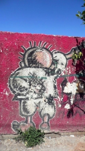 Graffiti in Ramallah showing “Handhala”